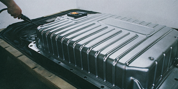 Airtight aluminum EV housing being inspected