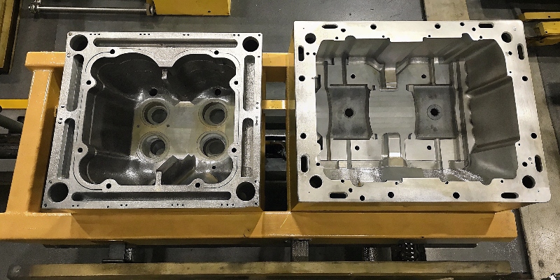 An X-ray image showing porosity inside a complex die-cast part next to a solid part.