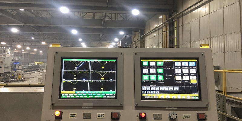 A control room dashboard showing real-time data analytics from a die casting machine