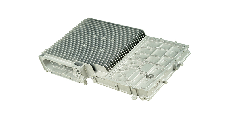 A side-by-side comparison image: on the left, a complex assembly of 15 welded steel parts; on the right, a single, clean aluminum die-cast part that replaces them.
