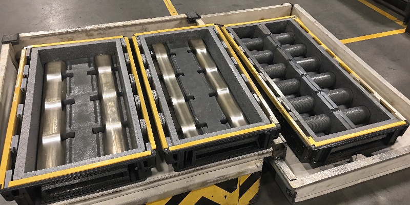 Custom dunnage trays used to transport sensitive die cast parts safely