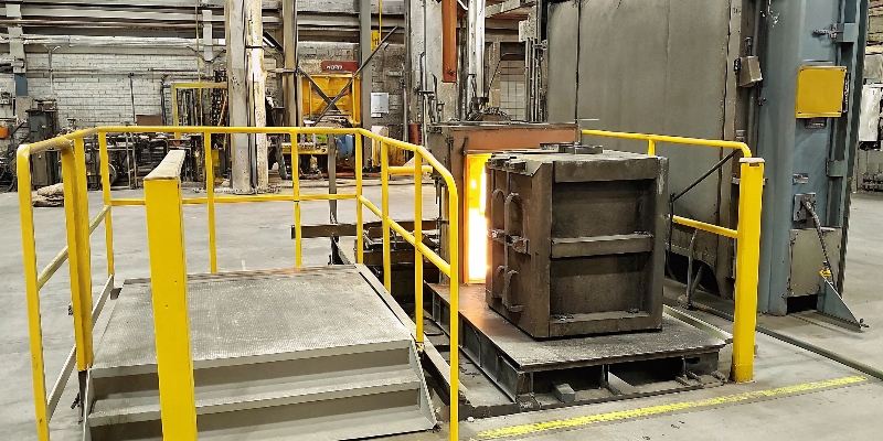 Preheating a Die Casting Mold A large die casting mold being preheated with integrated thermal oil lines connected to a heater unit
