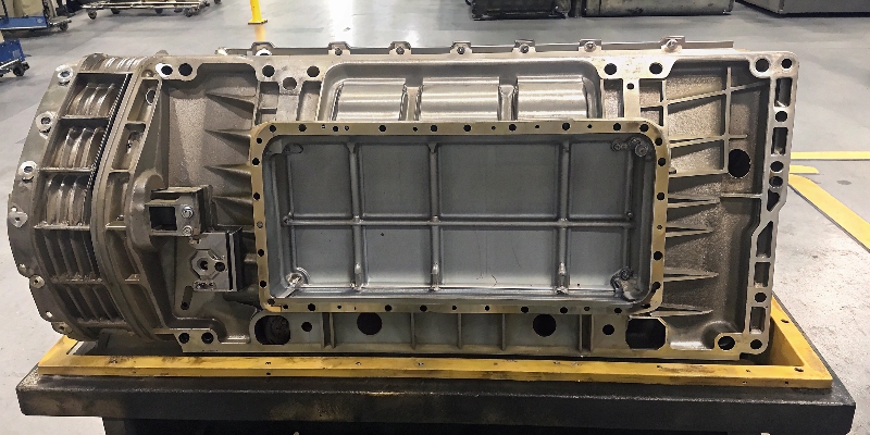 Lightweighting and Part Consolidation in Die Casting A single complex die-cast housing that consolidates multiple parts