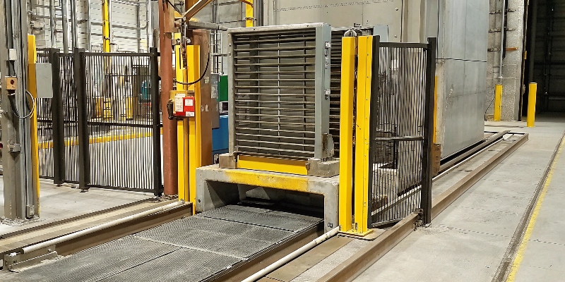 A slow-motion animation of a side-pole crash test on an EV, showing the battery enclosure protecting the cells from impact