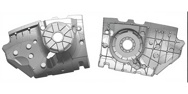 An aluminium die-cast structural component, possibly a shock tower, with visible ribs for strength and rigidity.