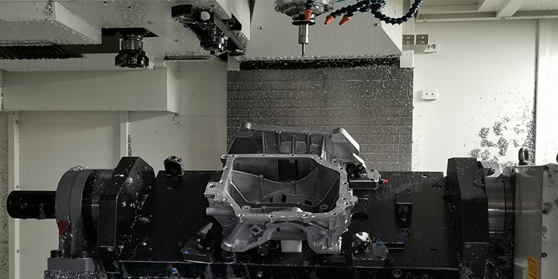 A graphic illustrating the cost savings derived from part consolidation, reduced post-processing, and higher production rates achievable with HPDC for EV components.