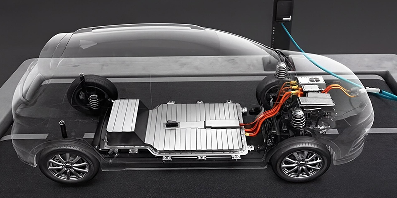 A dynamic visual showcasing an EV chassis with various high-pressure die-cast aluminum components highlighted, representing structural parts, battery enclosures, and motor housings.