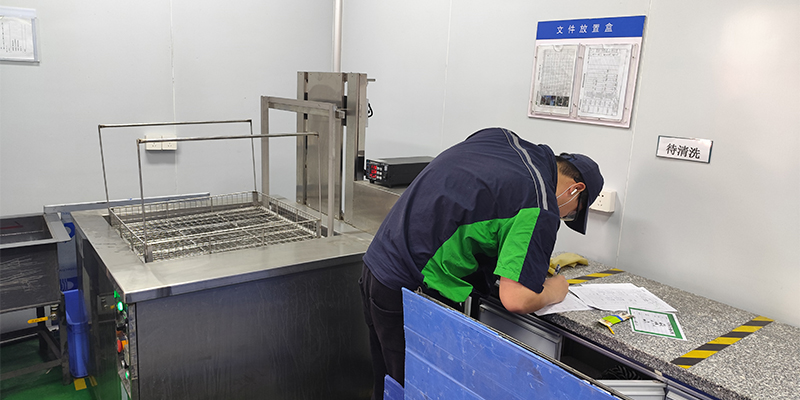A visual representation of EMP Tech's quality assurance processes: CMM measurement, X-ray inspection, material analysis, and a team meeting discussing quality reports.
